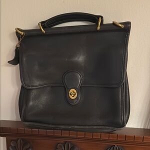 Coach Black Crossbody Bag with Structured Design and Gold Hardware
